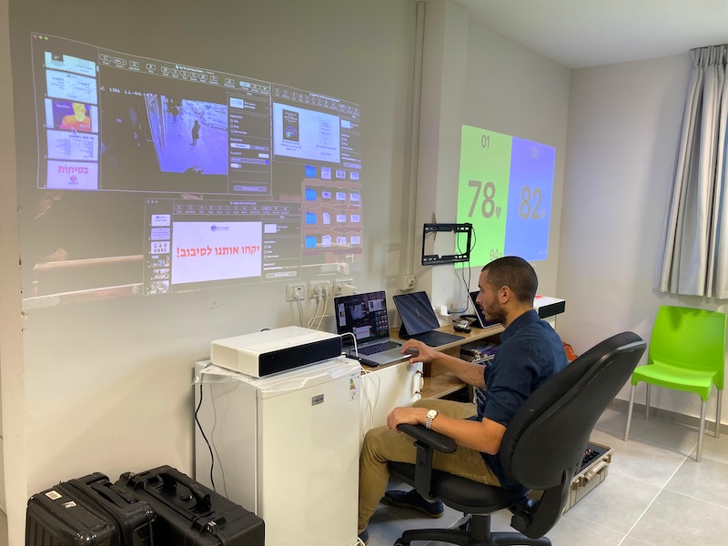 Michael Keren setting up the biofeedback technology before a Detant Combat Mindfulness workshop