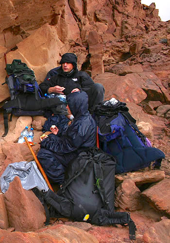 Drinking some tea in pouring rain in AKBAn Desert gathering