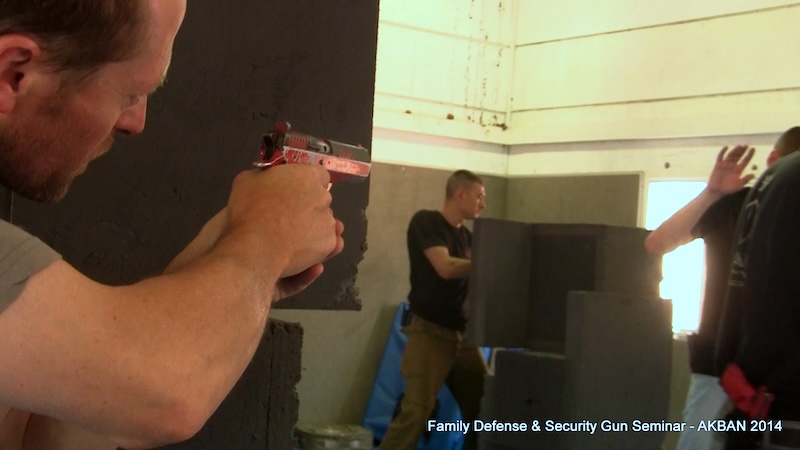 Turning a corner in an apartment with a hand gun