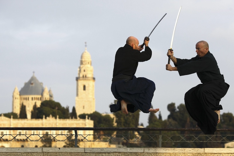 Katant jump kata in from of the walls of Jerusalem at sunset
