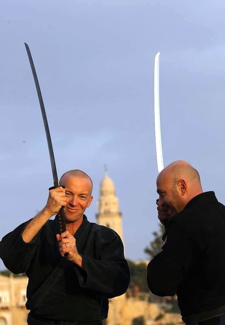 smiles at sunset sword training in the old city of Jerusalem